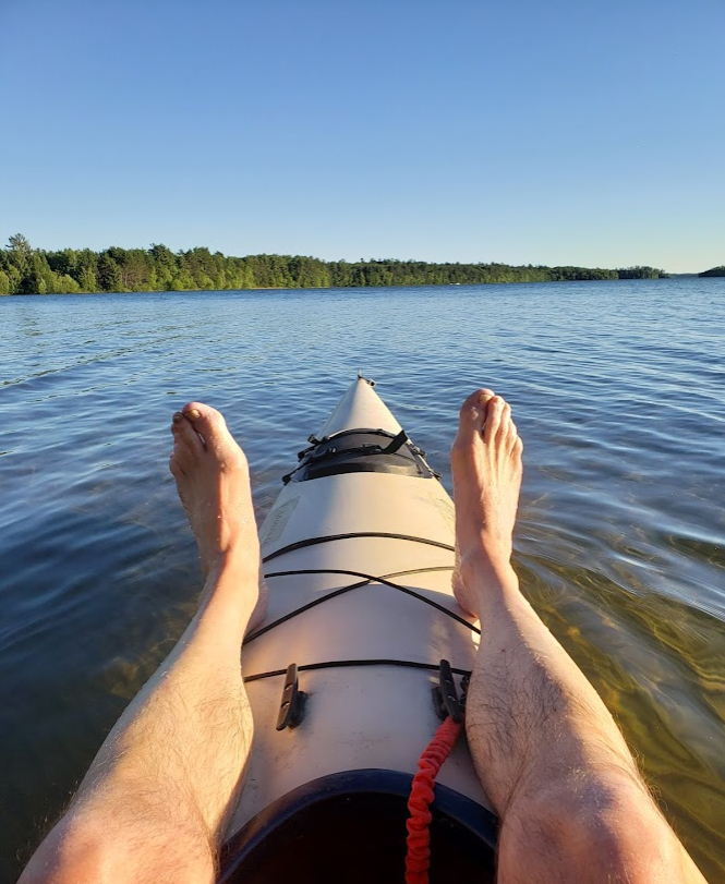 kayak on a calm lake on a sunny day