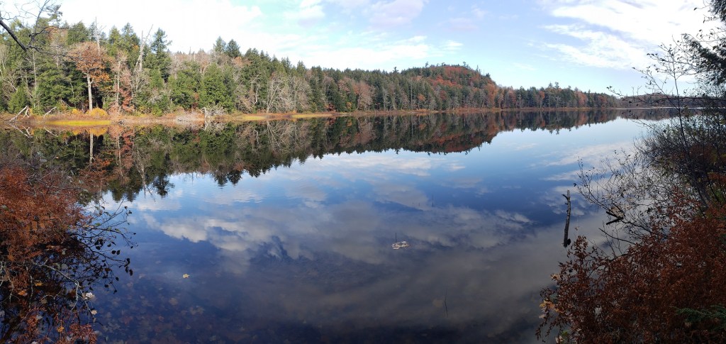 panoramic shot of a clear, crisp morning at Mirror Lake, Porcupine Mountains, Upper Michigan