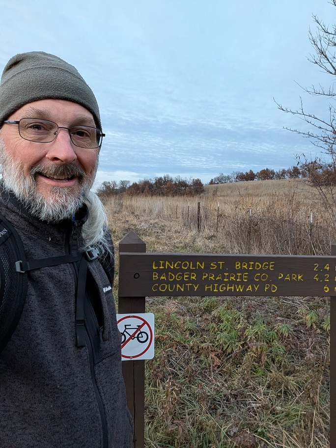 The author in a green wool cap and a charcoal gray jacket at the trailhead