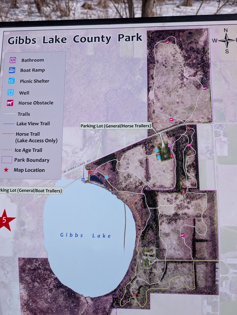 a map posted along the trailside shows the many trails in Gibb's Lake County Park